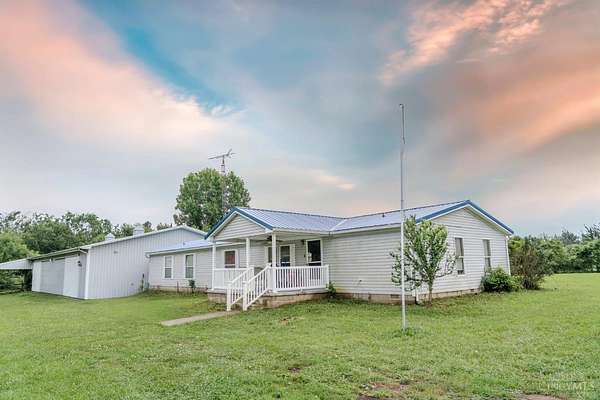 94.5 Acres of Land with Home for Sale in Brushcreek Township, Ohio