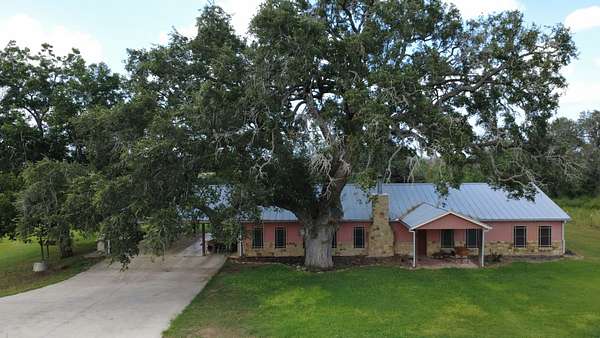 168 Acres of Land with Home for Sale in Floresville, Texas