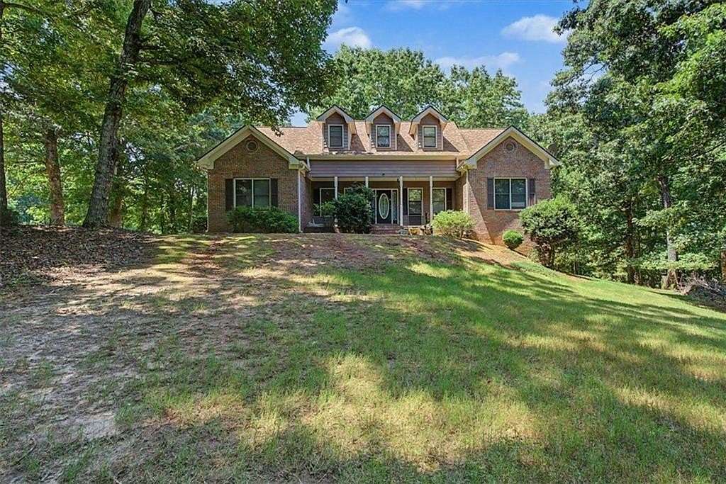 3.2 Acres of Land with Home for Sale in Flowery Branch, Georgia