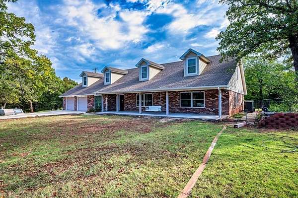 5.6 Acres of Land with Home for Sale in Harrah, Oklahoma