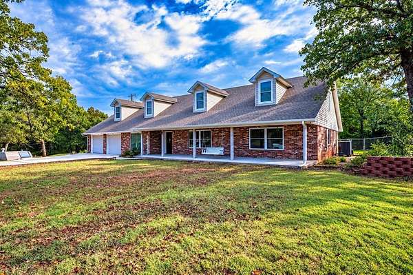 5.6 Acres of Land with Home for Sale in Harrah, Oklahoma