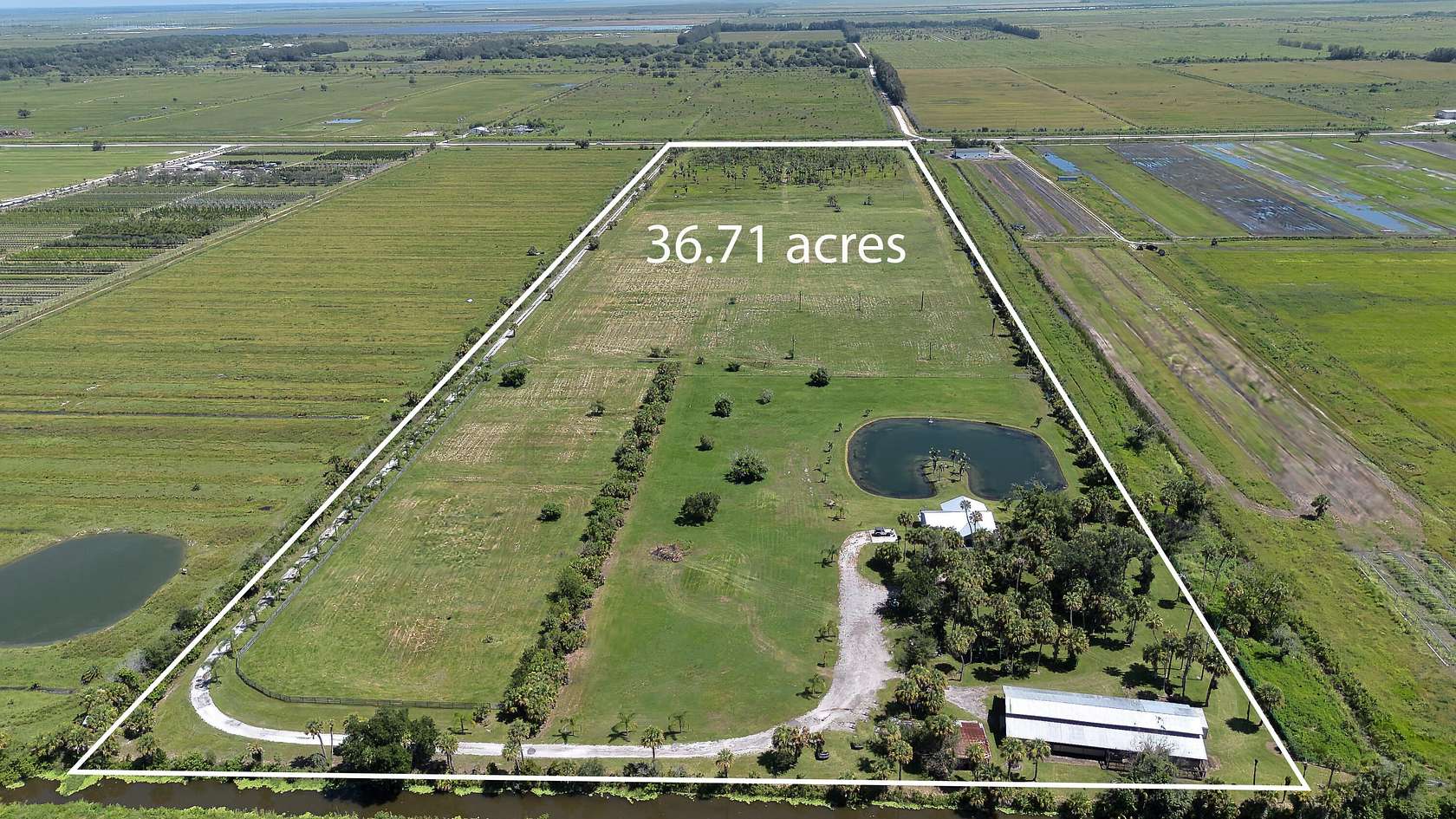 36.7 Acres of Agricultural Land with Home for Sale in Fort Pierce, Florida