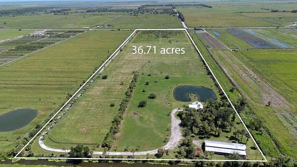 36.7 Acres of Agricultural Land with Home for Sale in Fort Pierce, Florida