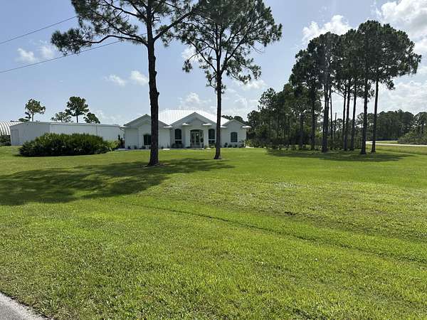 2.3 Acres of Land with Home for Sale in Port St. Lucie, Florida