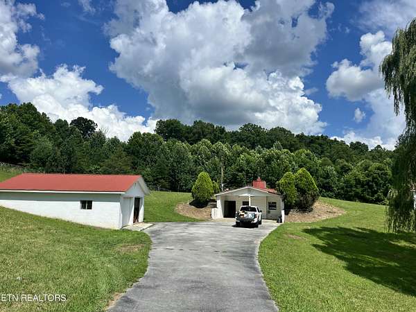 8.2 Acres of Land with Home for Sale in Robbins, Tennessee