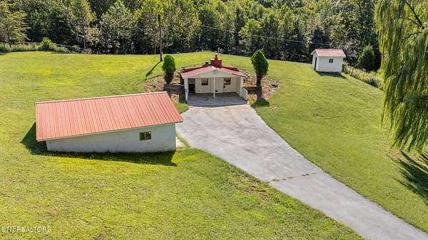 8.2 Acres of Land with Home for Sale in Robbins, Tennessee