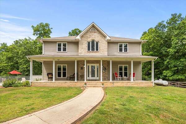 5.78 Acres of Land with Home for Sale in Harrison, Tennessee