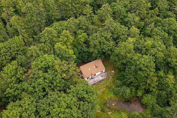 6 Acres of Land with Home for Sale in Effingham, New Hampshire