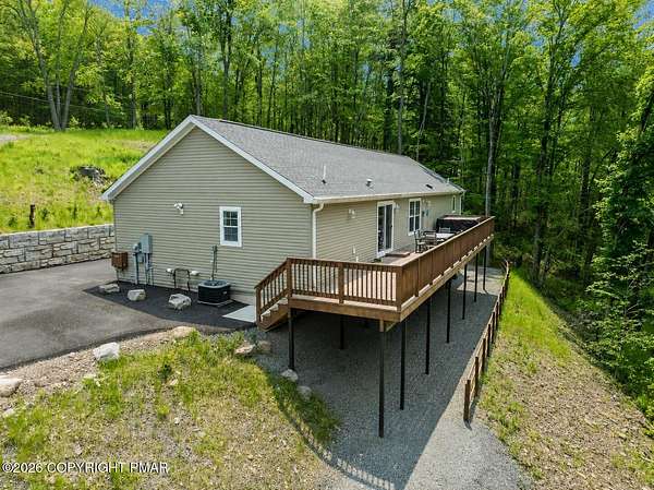 3 Acres of Land with Home for Sale in Pocono Lake, Pennsylvania