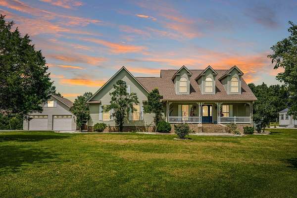 17.4 Acres of Land with Home for Sale in Mayfield, Kentucky