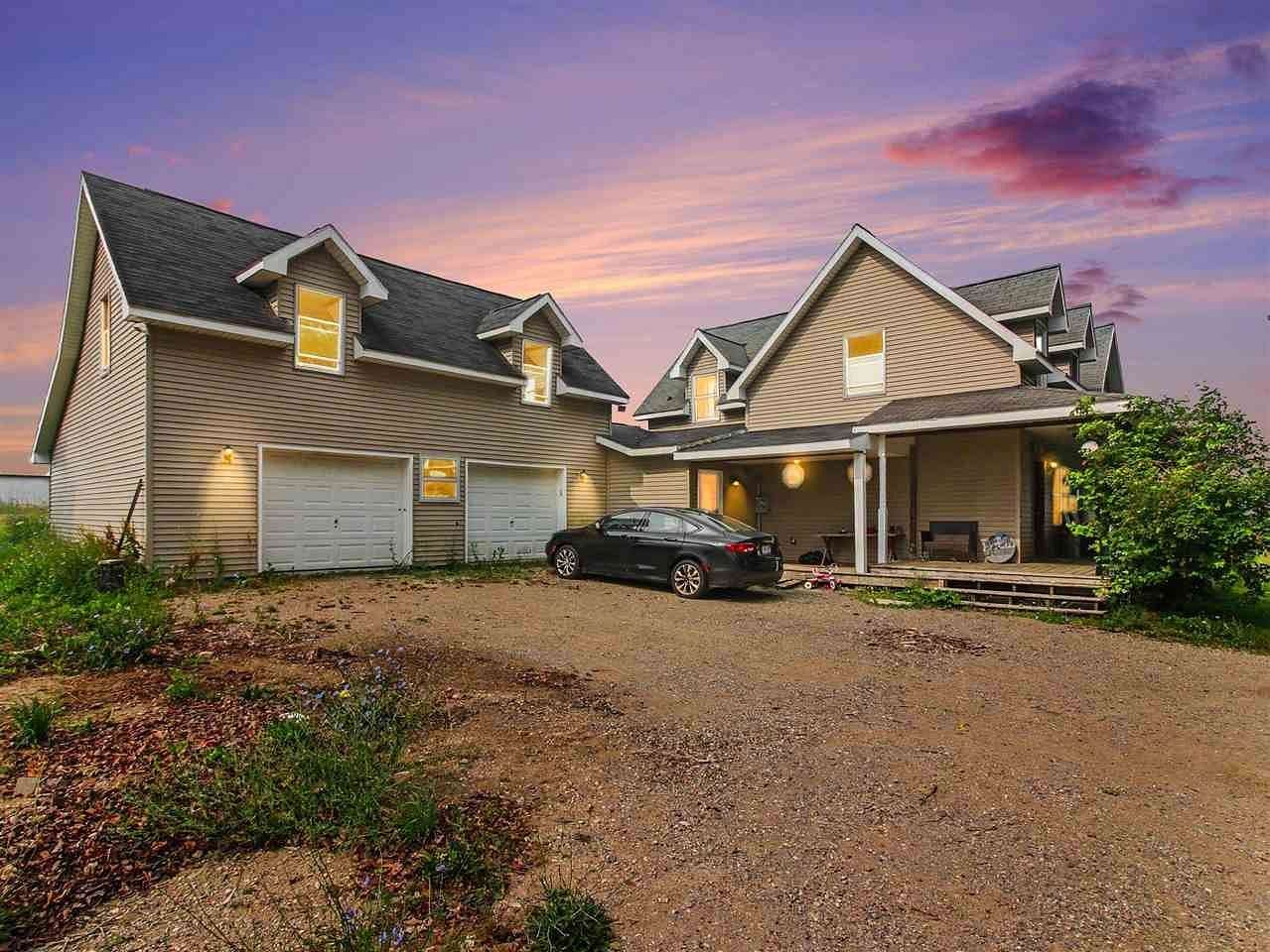 13 Acres of Land with Home for Sale in Charlevoix, Michigan