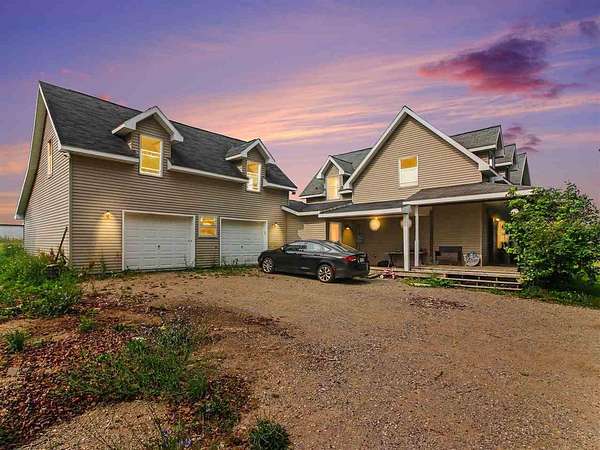 13 Acres of Land with Home for Sale in Charlevoix, Michigan
