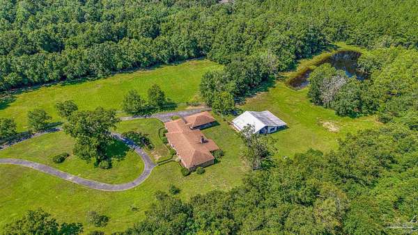 31.6 Acres of Agricultural Land with Home for Sale in Pensacola, Florida
