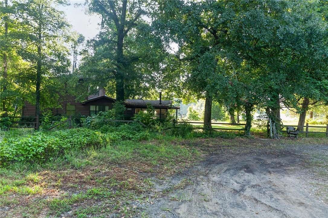 1.69 Acres of Land with Home for Sale in New Blaine, Arkansas