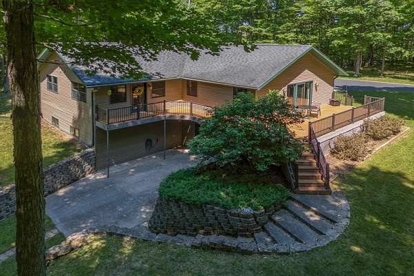 2 Acres of Land with Home for Sale in Three Lakes, Wisconsin