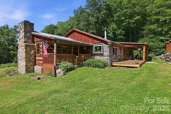 9.66 Acres of Land with Home for Sale in Mars Hill, North Carolina