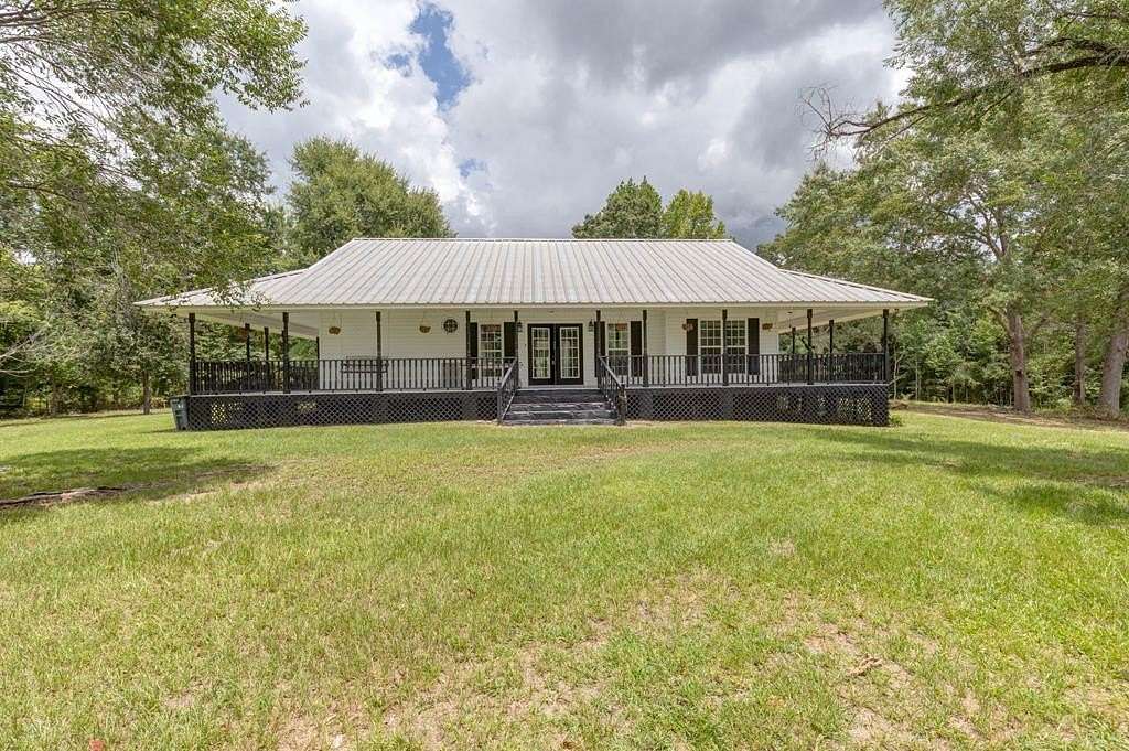 7.47 Acres of Land with Home for Sale in Smiths Station, Alabama