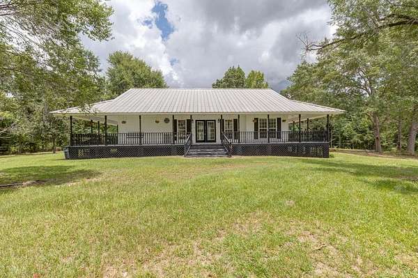 7.47 Acres of Land with Home for Sale in Smiths Station, Alabama