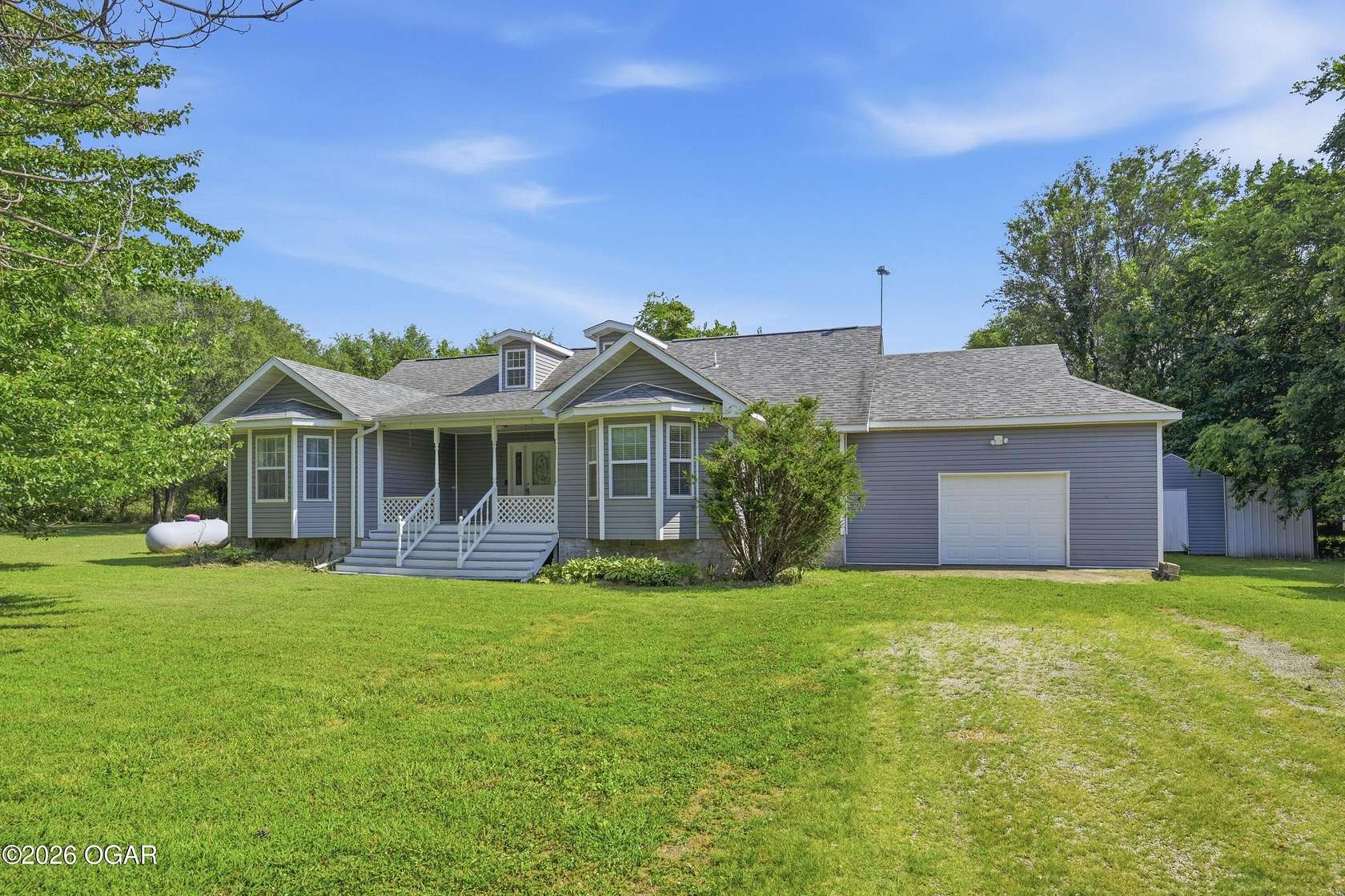 5 Acres of Land with Home for Sale in Carthage, Missouri