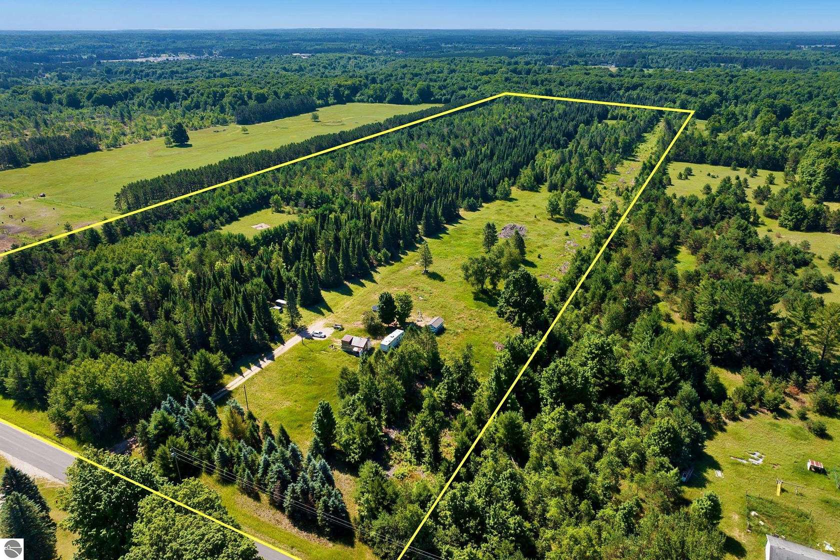 40 Acres of Recreational Land with Home for Sale in Mancelona, Michigan
