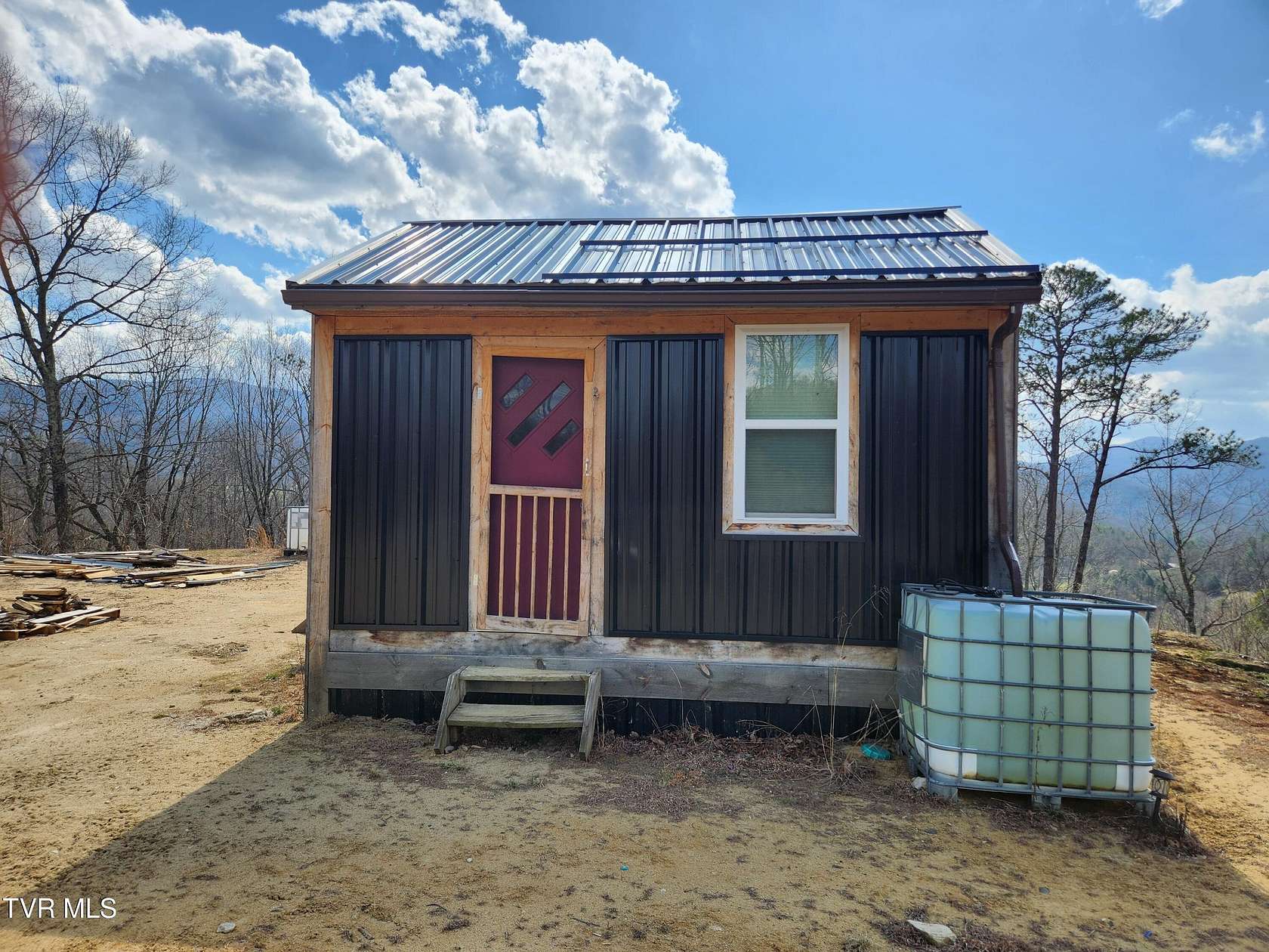7.3 Acres of Land with Home for Sale in Roan Mountain, Tennessee