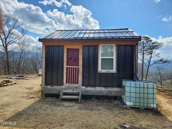 7.3 Acres of Land with Home for Sale in Roan Mountain, Tennessee