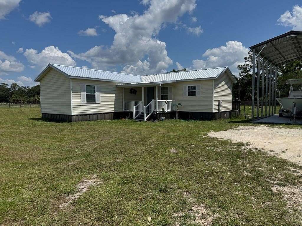 12 Acres of Land with Home for Sale in Horseshoe Beach, Florida