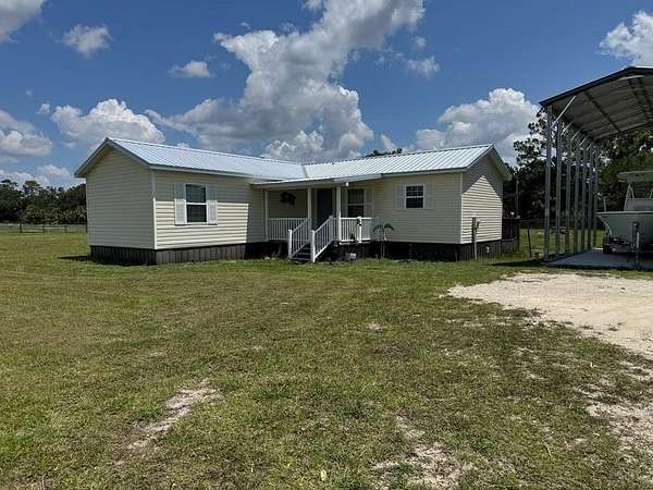 12 Acres of Land with Home for Sale in Horseshoe Beach, Florida