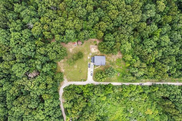 3 Acres of Land with Home for Auction in De Soto, Missouri