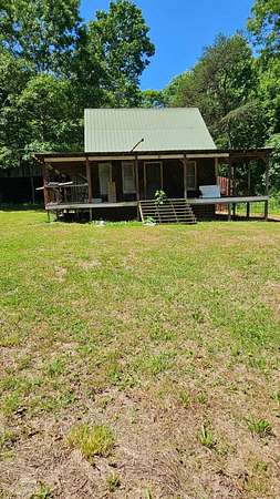 5 Acres of Land with Home for Sale in Deer Lodge, Tennessee