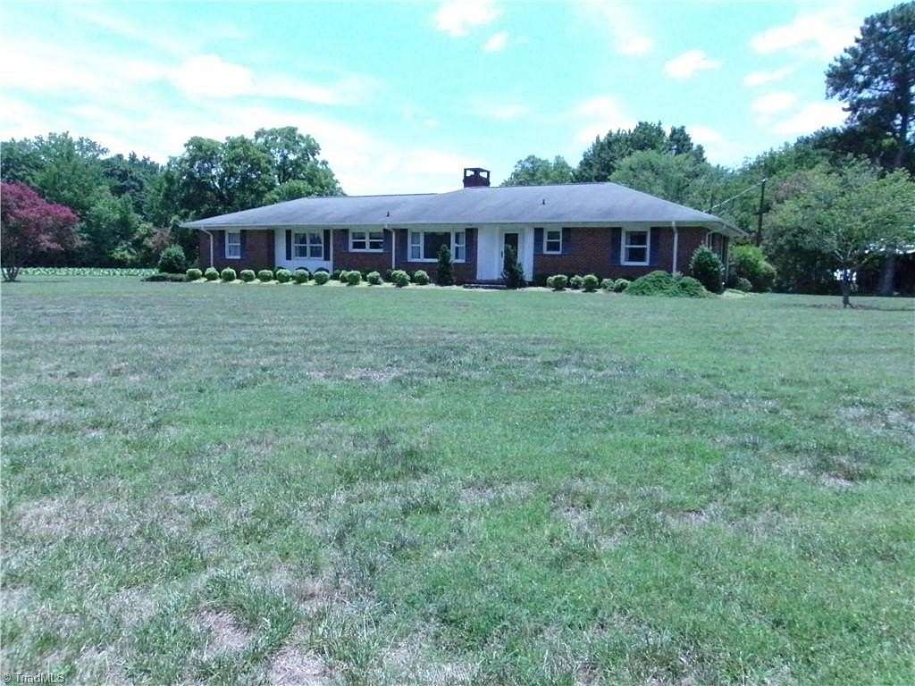1.78 Acres of Land with Home for Sale in McLeansville, North Carolina