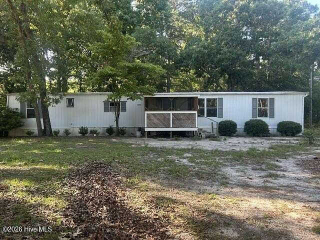 1.73 Acres of Land with Home for Sale in Leland, North Carolina