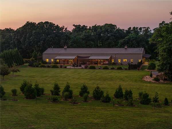5 Acres of Land with Home for Sale in Gravette, Arkansas