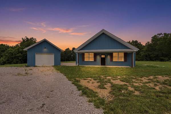 10.5 Acres of Recreational Land with Home for Sale in Corinth, Kentucky
