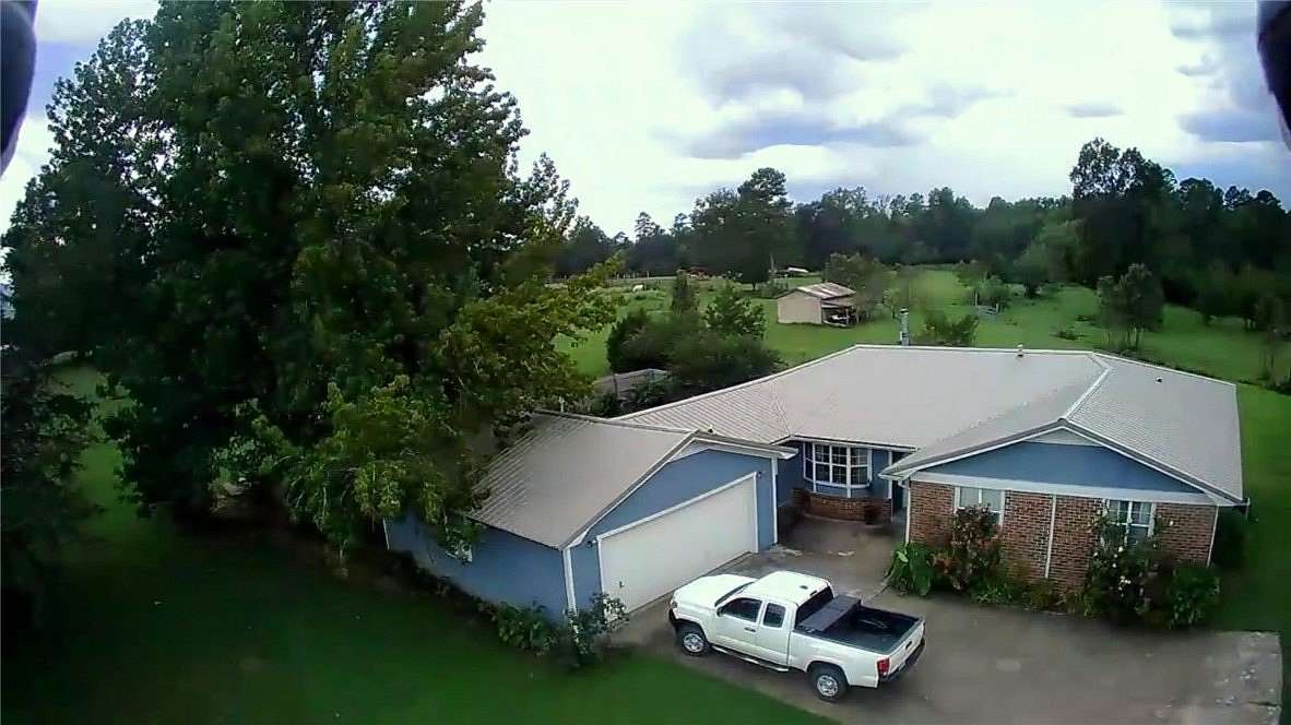 6.5 Acres of Land with Home for Sale in Plainview, Arkansas