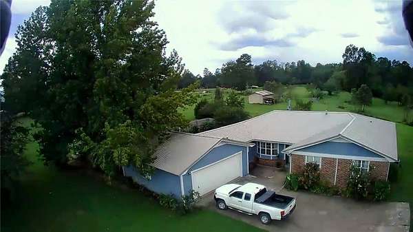6.5 Acres of Land with Home for Sale in Plainview, Arkansas
