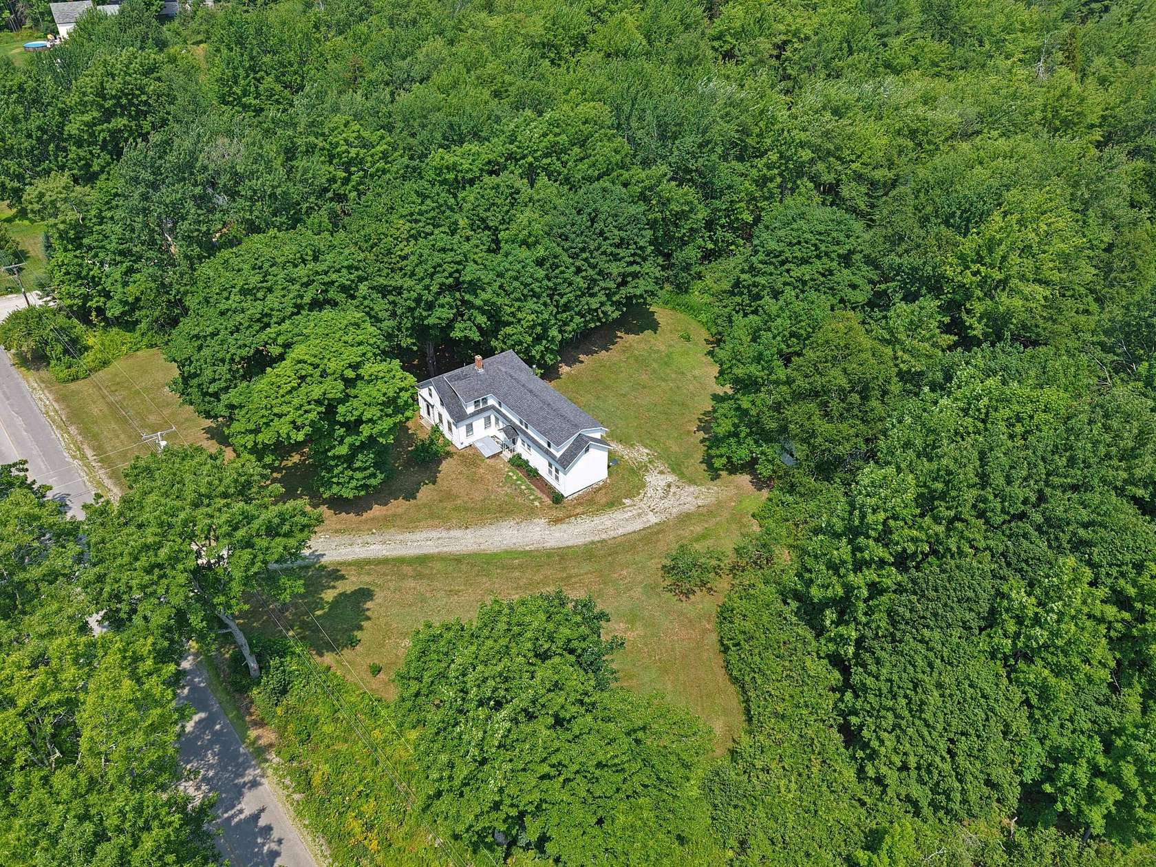 17 Acres of Land with Home for Sale in Hancock, Maine