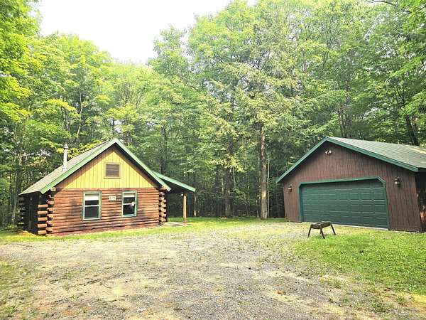 5 Acres of Land with Home for Sale in Minocqua, Wisconsin