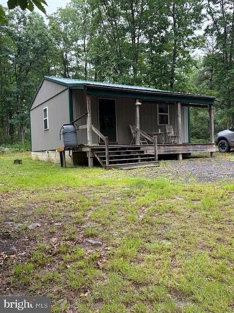 7.35 Acres of Land with Home for Sale in Snow Shoe Township, Pennsylvania