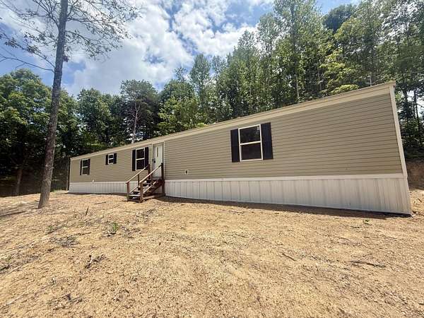 2.3 Acres of Land with Home for Sale in East Bernstadt, Kentucky