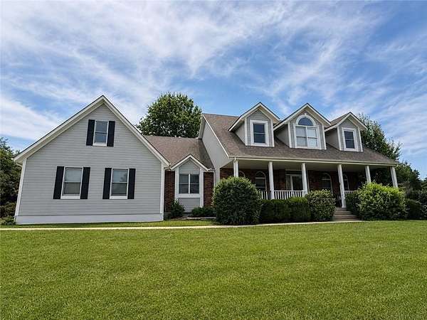 9.2 Acres of Land with Home for Sale in Raymore, Missouri