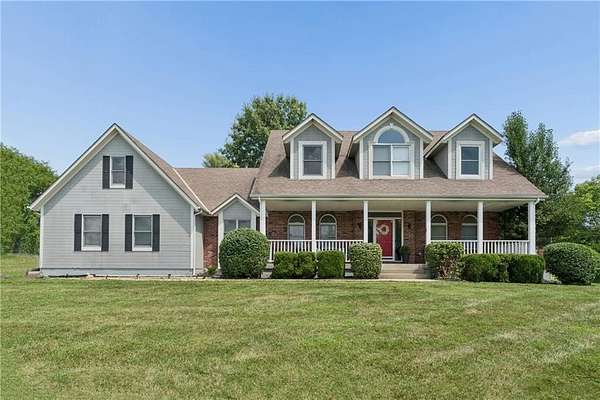 9.2 Acres of Land with Home for Sale in Raymore, Missouri