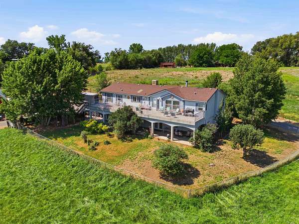 6.5 Acres of Land with Home for Sale in Delta, Colorado