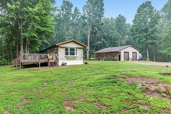40.7 Acres of Land with Home for Sale in Bitely, Michigan