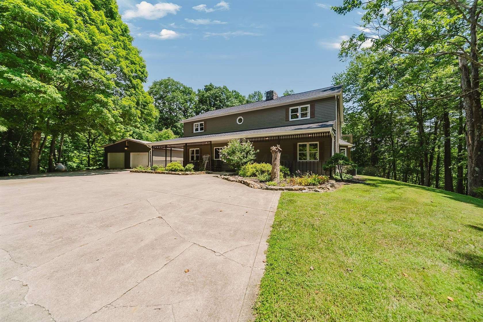 23.6 Acres of Recreational Land with Home for Sale in Rockbridge, Ohio
