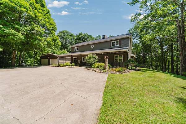23.6 Acres of Recreational Land with Home for Sale in Rockbridge, Ohio