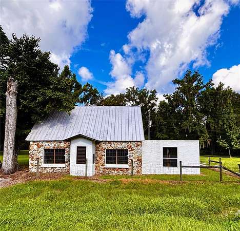 15.1 Acres of Land with Home for Sale in Webster, Florida