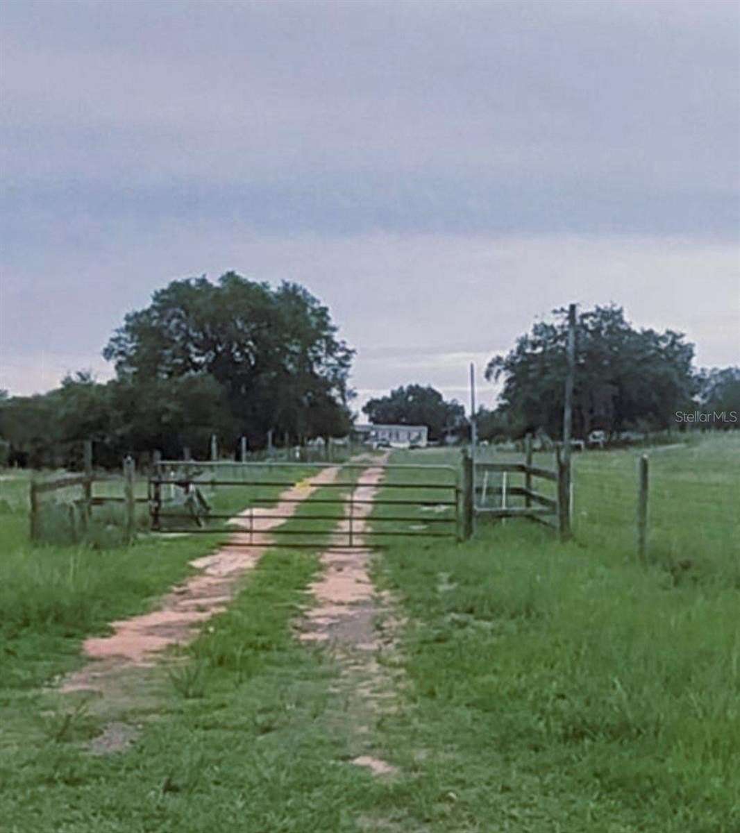 7.35 Acres of Land with Home for Sale in Babson Park, Florida
