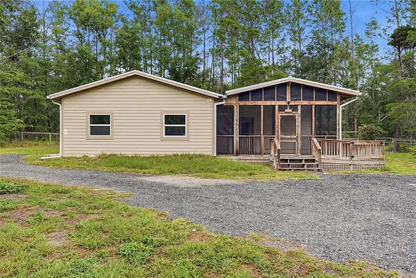 4.82 Acres of Land with Home for Sale in High Springs, Florida