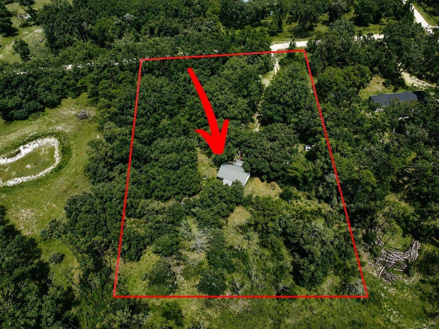4.74 Acres of Land with Home for Sale in Old Town, Florida